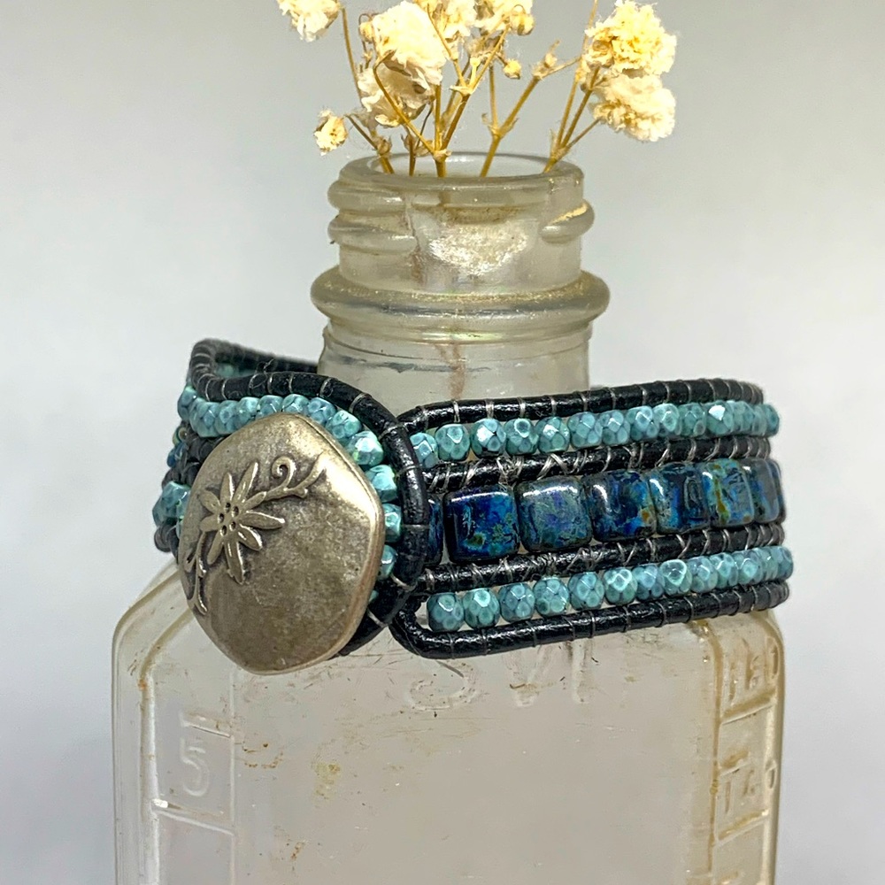Leather bracelet.